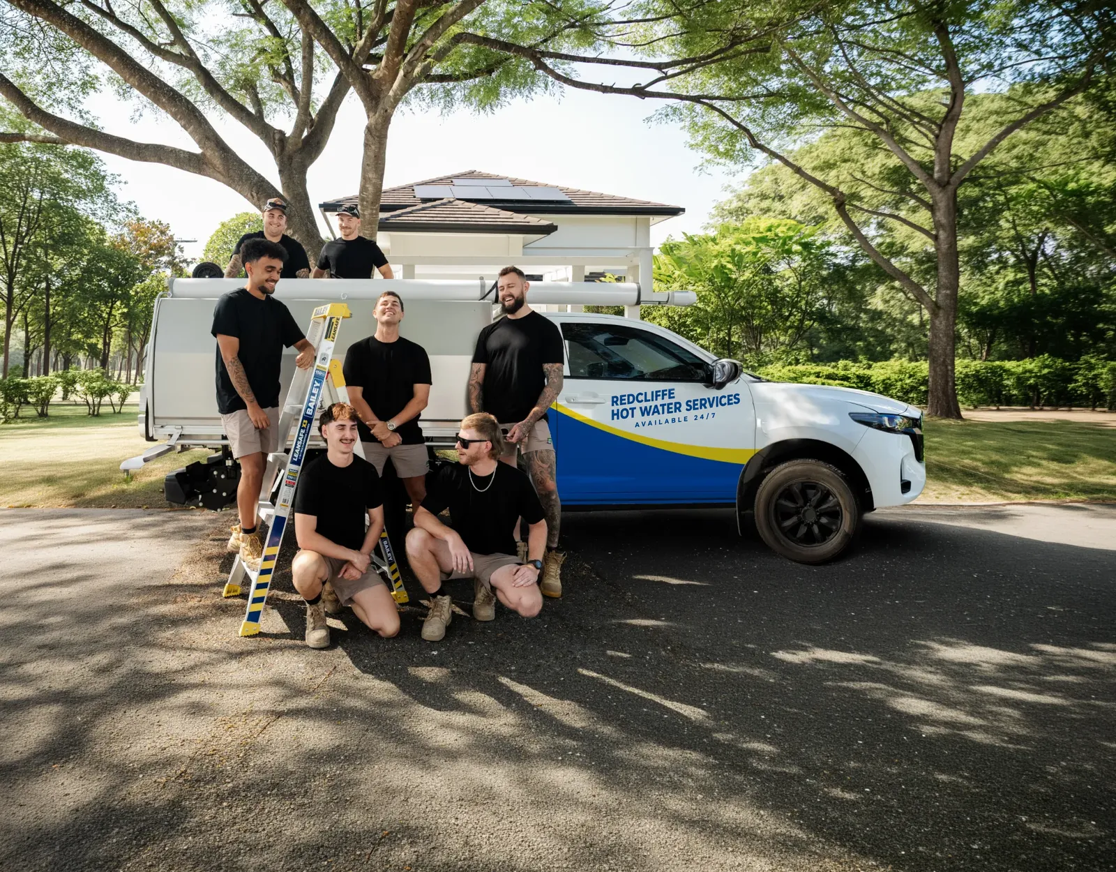 Redcliffe Hot Water Services team and ute